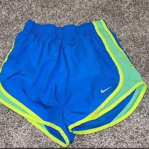 blue and green nike shorts